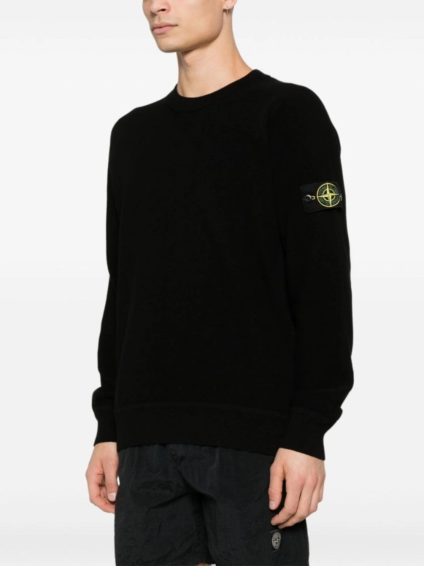 Crew Neck Black Sweater With Ribbed Cuffs And Hem