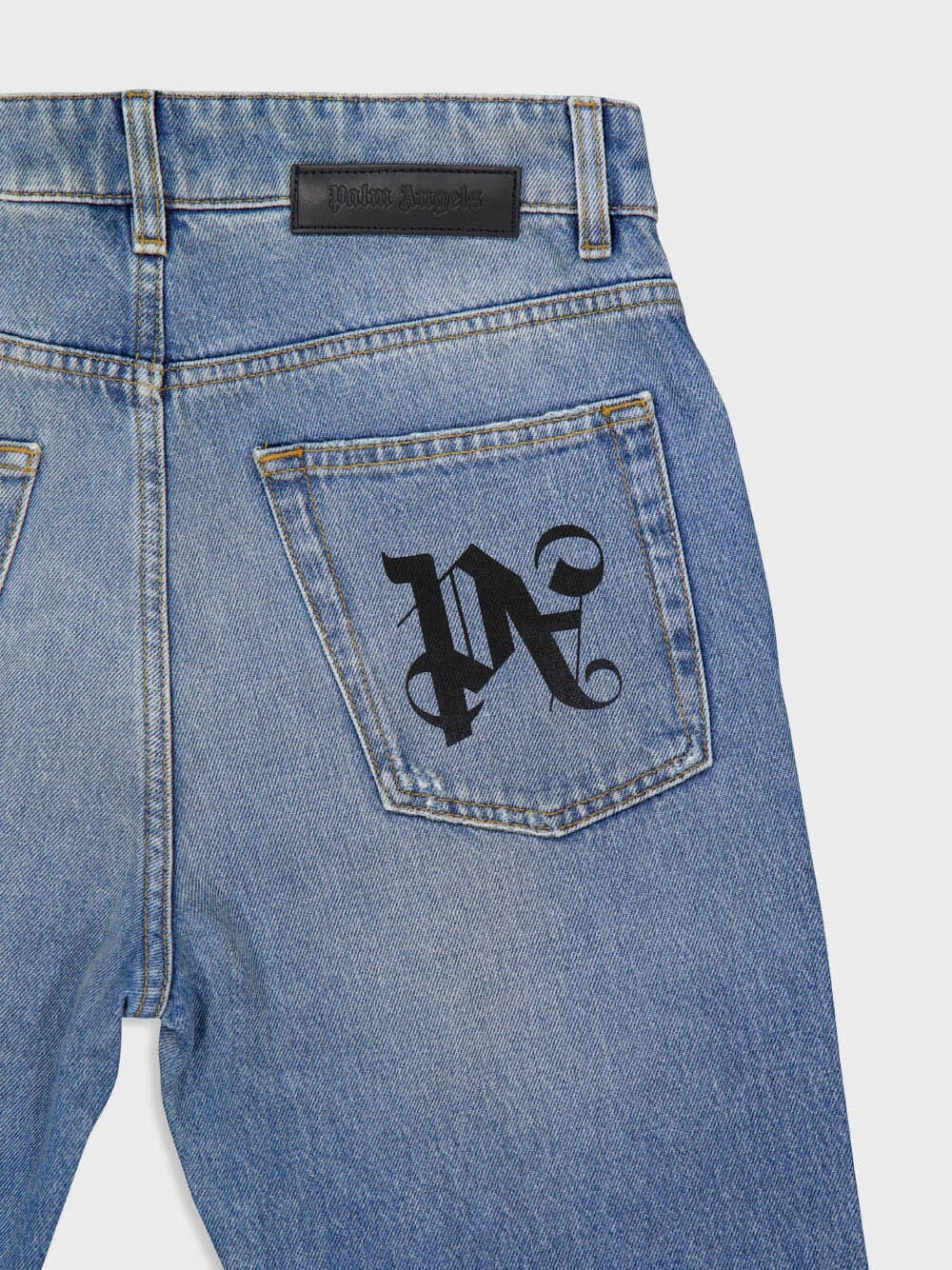 Distressed Monogram Jeans