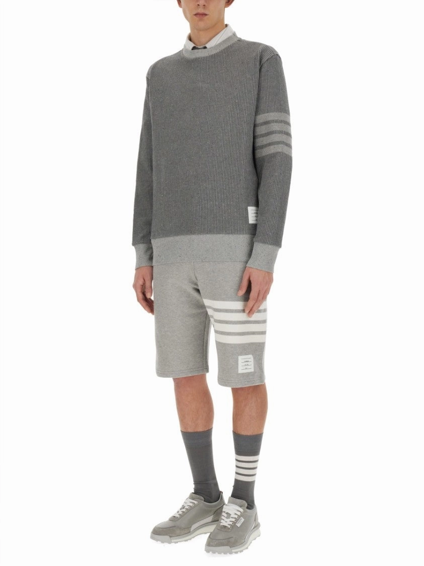 Ribbed Grey Sweater With Striped Sleeves